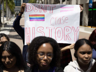 Students from the Miami-Dade County Public Schools School for Advanced Studies protest during a statewide walkout on April 21, 2023 in Miami, Florida.