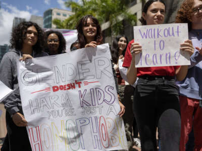 Students from the Miami-Dade County Public Schools School for Advanced Studies protest during a statewide walkout on April 21, 2023 in Miami, Florida.