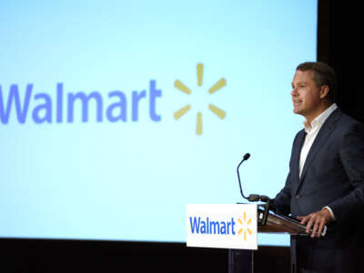 Walmart President and CEO Doug McMillon speaks at the Walmart annual formal business and shareholders meeting on May 30, 2018 in Rogers, Arkansas.