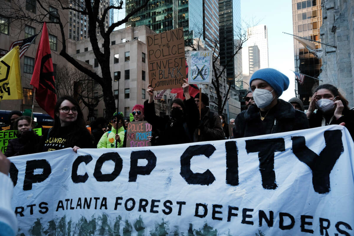 Activists participate in a protest against the proposed Cop City being built in an Atlanta forest on March 09, 2023 in New York City.