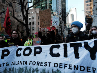 Activists participate in a protest against the proposed Cop City being built in an Atlanta forest on March 09, 2023 in New York City.