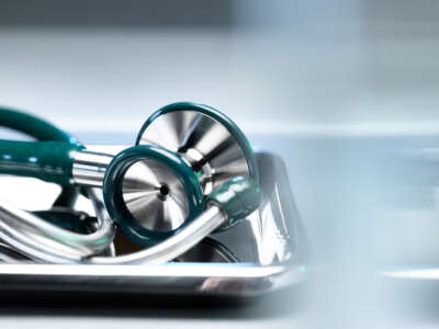 Surgical instruments, stethoscope in a bowl