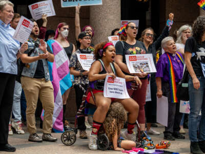 People chant during a protest at the Texas State Capitol on April 20, 202,3 in Austin, Texas. Community members and activists rallied together in protest against numerous anti-LGBTQIA+ and drag bills being proposed in the legislature.