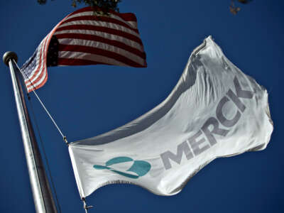 A Merck flag flies in front of the company's building on October 2, 2013, in Summit, New Jersey.