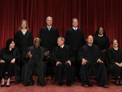 U.S. Supreme Court (front row L-R) Associate Justice Sonia Sotomayor, Associate Justice Clarence Thomas, Chief Justice of the United States John Roberts, Associate Justice Samuel Alito, and Associate Justice Elena Kagan, (back row L-R) Associate Justice Amy Coney Barrett, Associate Justice Neil Gorsuch, Associate Justice Brett Kavanaugh and Associate Justice Ketanji Brown Jackson pose for their official portrait at the East Conference Room of the Supreme Court building on October 7, 2022, in Washington, D.C.