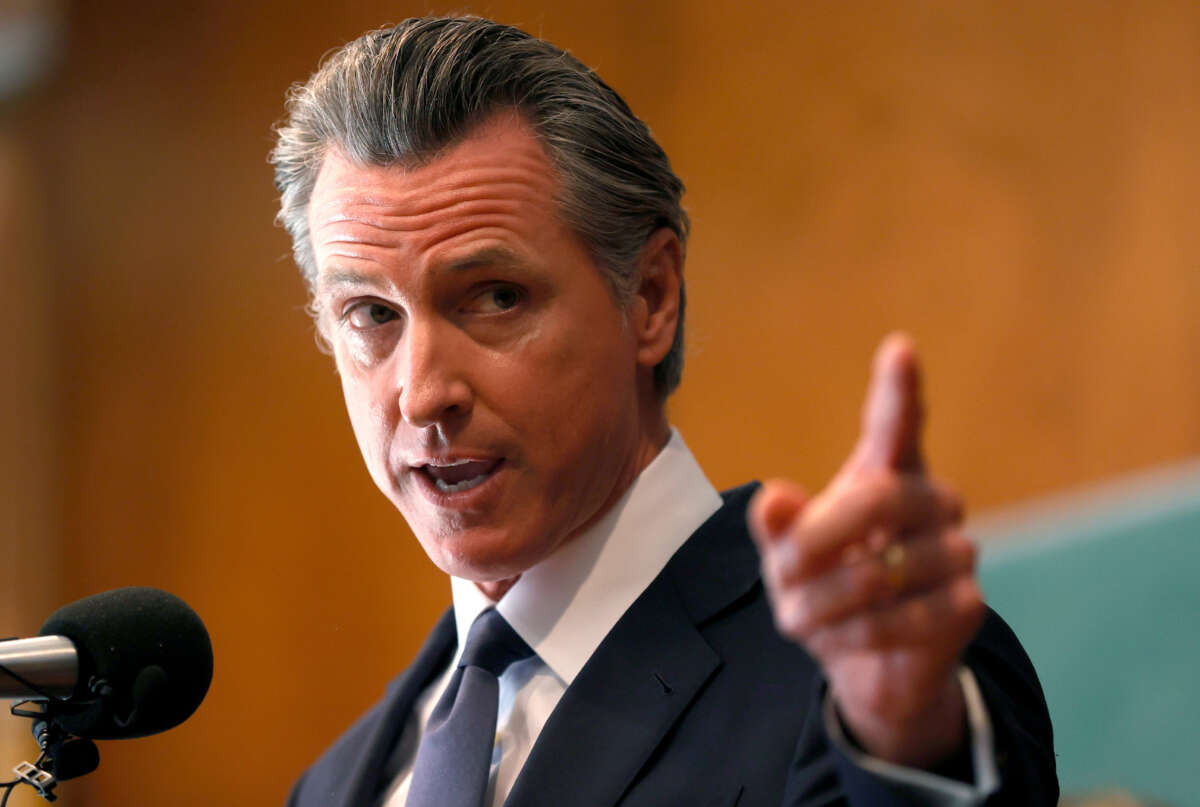 California Gov. Gavin Newsom speaks to union workers and volunteers on election day at the IBEW Local 6 union hall on September 14, 2021, in San Francisco, California.