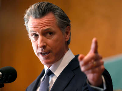 California Gov. Gavin Newsom speaks to union workers and volunteers on election day at the IBEW Local 6 union hall on September 14, 2021, in San Francisco, California.