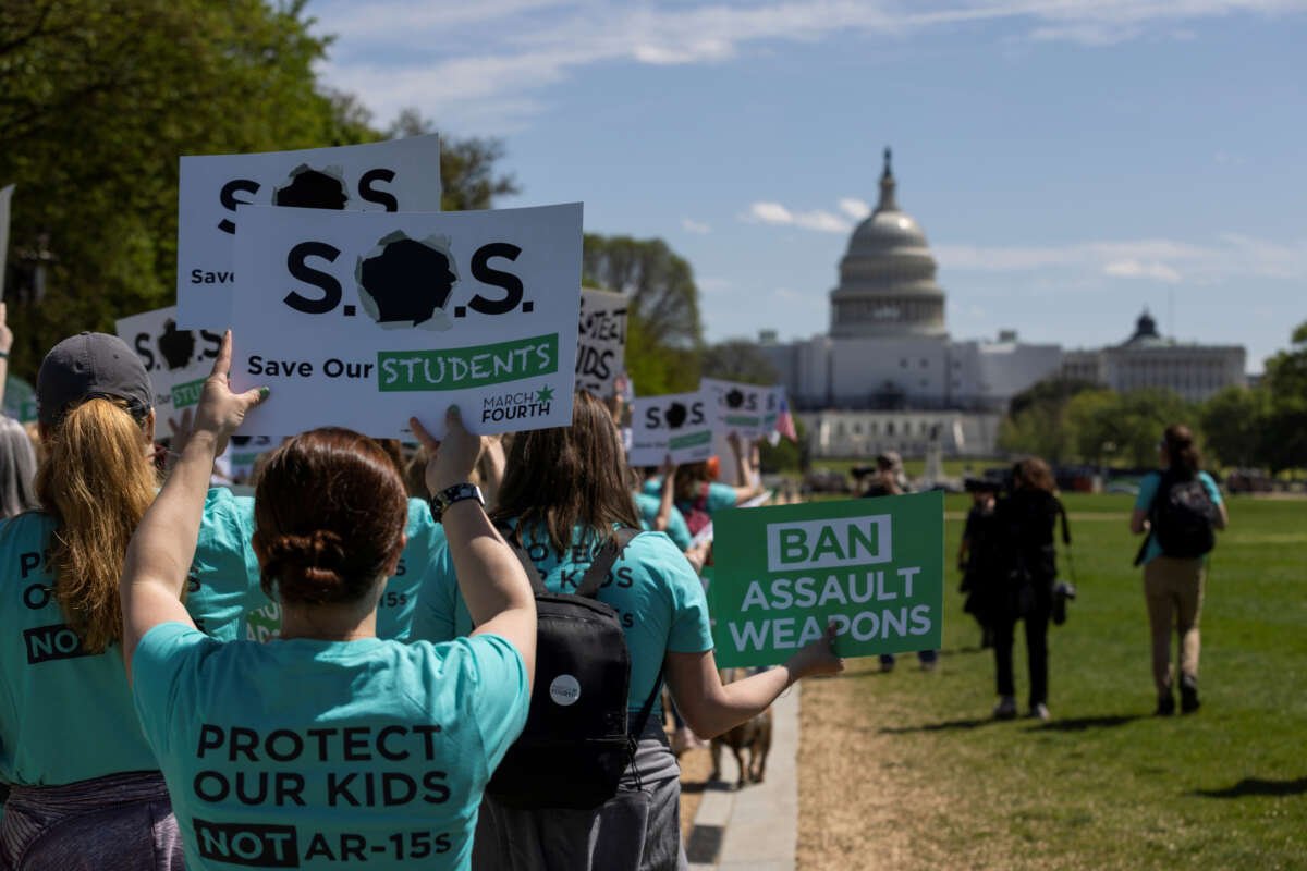 People march to the Capitol to protest for a ban on assault weapons, in Washington, D.C., on April 17, 2023.