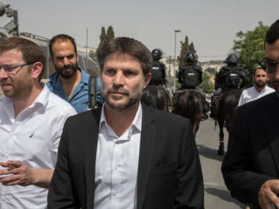 Member of the Knesset and leader of the far right Zionut Datit (Jewish Zionism) party, Bezalel Smotrich, visits the neighborhood of Sheikh Jarrah of the Israeli-annexed East Jerusalem on May 10, 2021, in Israel.
