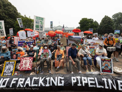 Hundreds of frontline and Appalachian climate activists rally against President Biden's endorsement of the Mountain Valley Pipeline on June 8, 2023.