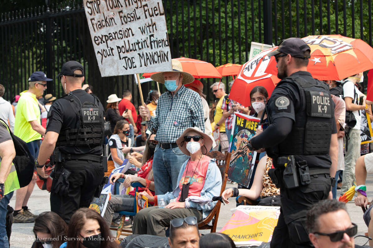 Hundreds of frontline and Appalachian climate activists rally against President Biden's endorsement of the Mountain Valley Pipeline on June 8, 2023.