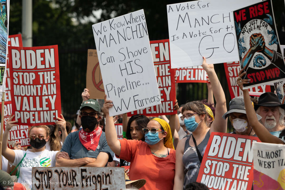 Hundreds of frontline and Appalachian climate activists rally against President Biden's endorsement of the Mountain Valley Pipeline on June 8, 2023.