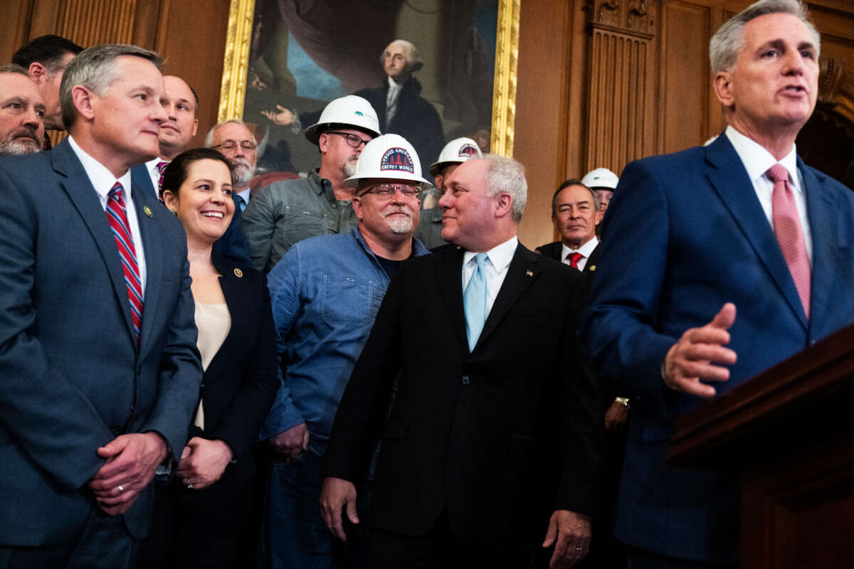 House Majority Leader Steve Scalise, second from right, talks with an energy industry worker as Speaker of the House Kevin McCarthy conducts a news conference after the House passed the Lower Energy Costs Act in the U.S. Capitol on March 30, 2023.