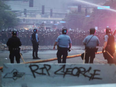 Law enforcement officers amass along Lake Street in Minneapolis, Minnesota, on May 29, 2020.