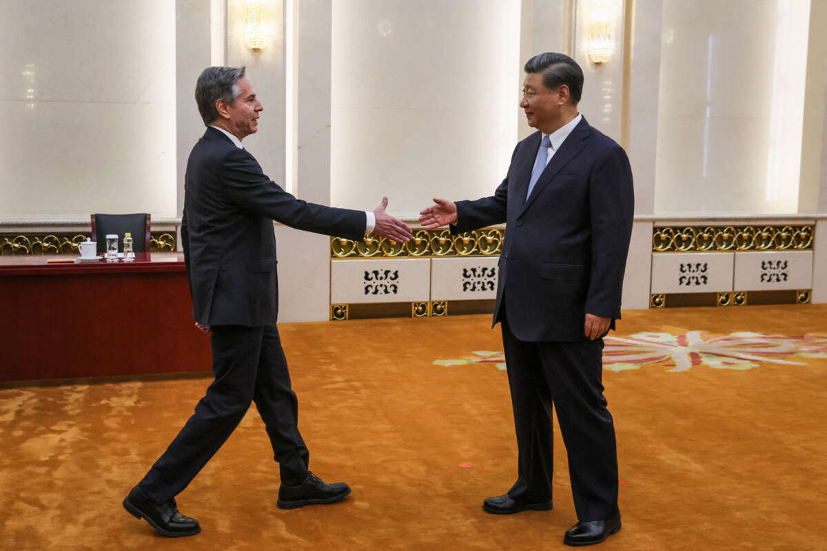 U.S. Secretary of State Antony Blinken (left) shakes hands with China's President Xi Jinping in the Great Hall of the People in Beijing on June 19, 2023.