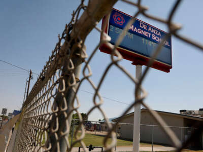 A temperature of 114 degrees Fahrenheit is displayed on a digital sign outside of De Anza Magnet School on June 12, 2022, in El Centro, California.