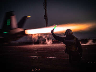 An F/A-18F Super Hornet launches off the aircraft carrier USS Nimitz during routine operations in the Philippine Sea, on April 8, 2023.