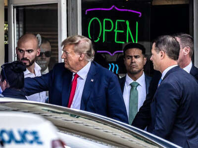 Former President Donald Trump greets supporters at Versailles Restaurant and Bakery in Little Havana after his appearance at the Miami federal courthouse, on June 13, 2023.