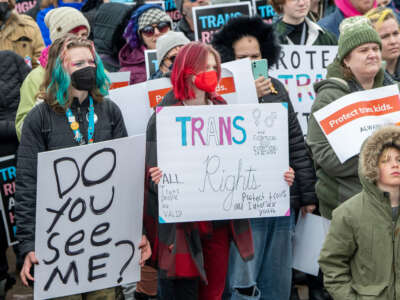 People protest in support of transgender rights in St. Paul, Minnesota, on March 6, 2022.