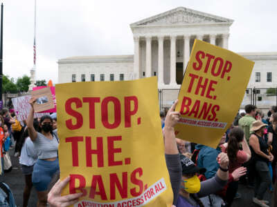 Abortion rights activists march outside of the Supreme Court in Washington, D.C., on May 14, 2022.