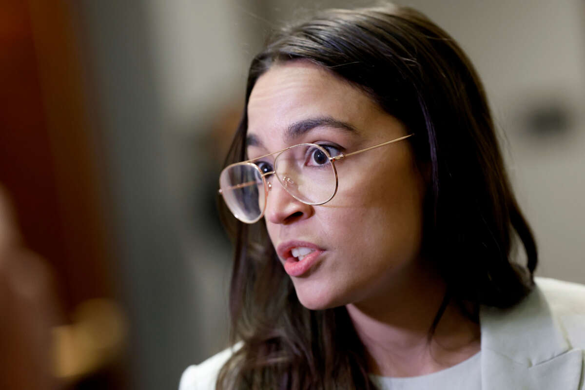 Rep. Alexandria Ocasio-Cortez speaks to reporters at the U.S. Capitol on May 31, 2023, in Washington, D.C.