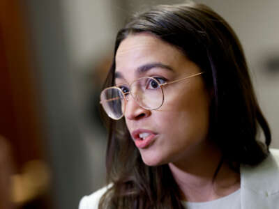 Rep. Alexandria Ocasio-Cortez speaks to reporters at the U.S. Capitol on May 31, 2023, in Washington, D.C.