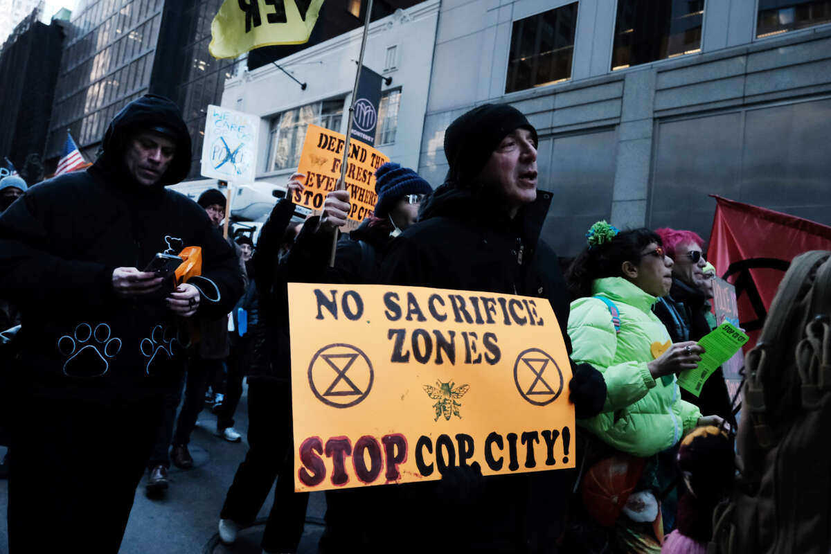 Activists participate in a protest against the proposed Cop City being built in an Atlanta forest on March 9, 2023, in New York City.