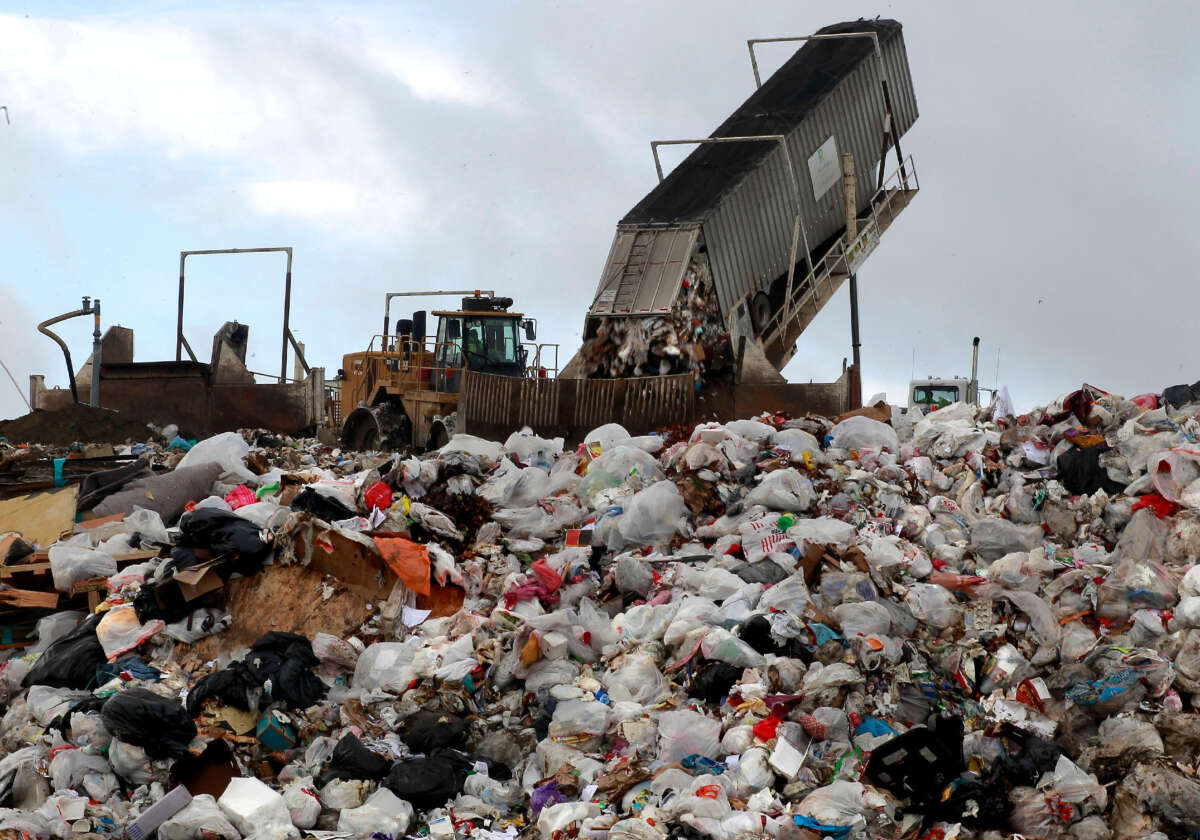 A San Francisco Recology truck drops about 20 tons of trash at the Waste Management landfill in Livermore, California, on December 26, 2012.