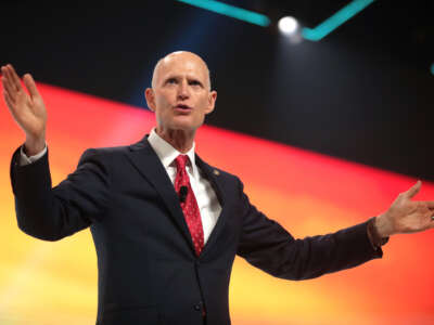 Sen. Rick Scott speaks with attendees at the 2021 Student Action Summit hosted by Turning Point USA at the Tampa Convention Center in Tampa, Florida.