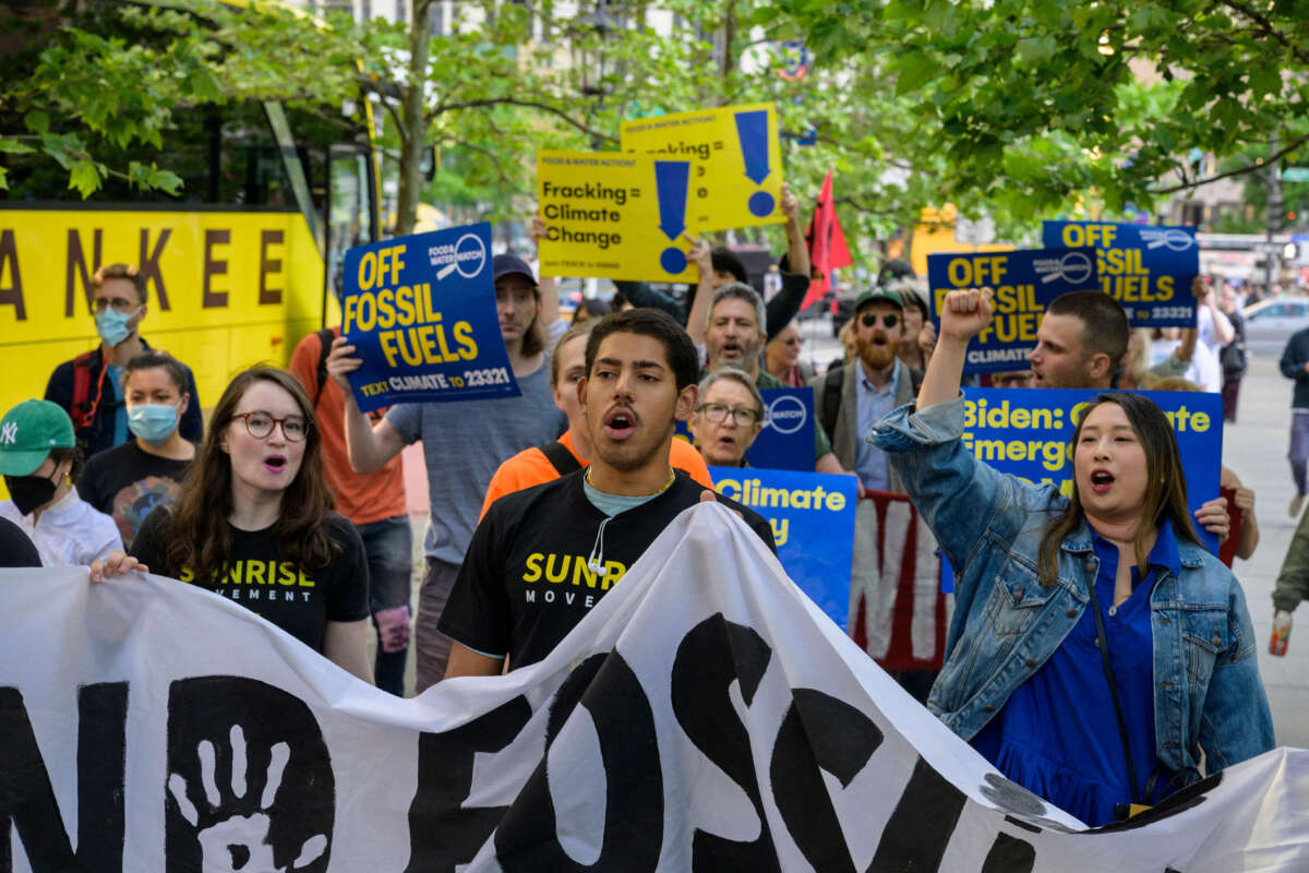 Climate activists demonstrate in Central Park to end all fossil fuels as President Joe Biden is in town for a campaign reception, on May 10, 2023, in New York City.