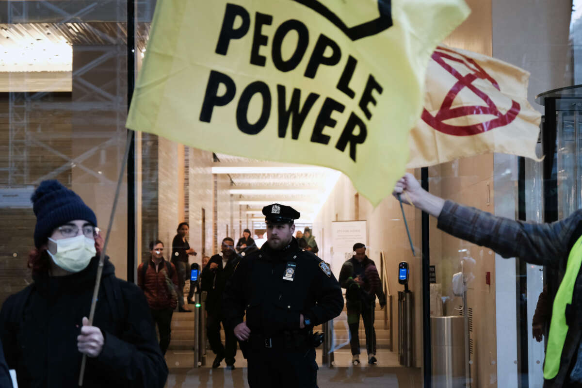 Activists participate in a protest against the proposed Cop City being built in an Atlanta forest on March 9, 2023, in New York City.