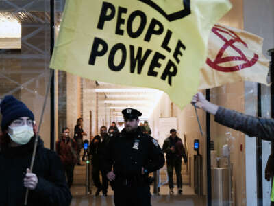 Activists participate in a protest against the proposed Cop City being built in an Atlanta forest on March 9, 2023, in New York City.