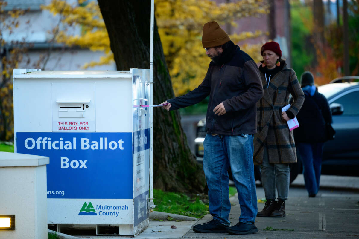 Voters cast their ballots at official ballot boxes on November 8, 2022, in Portland, Oregon.