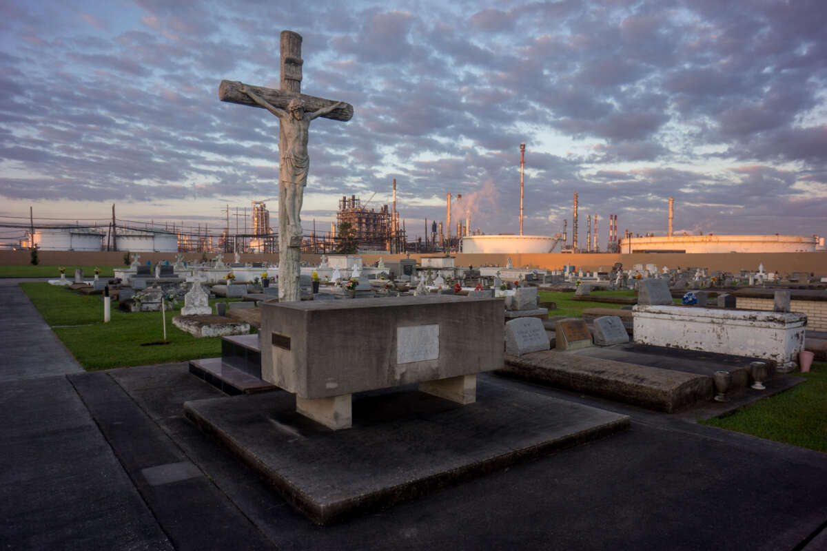 A cemetery stands in stark contrast to the chemical plants that surround it in Baton Rouge, Louisiana, on October 15, 2013.