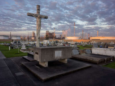 A cemetery stands in stark contrast to the chemical plants that surround it in Baton Rouge, Louisiana, on October 15, 2013.