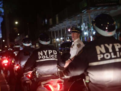 Police mass around a commemoration of the third anniversary of George Floyd's death at the hands of police, in New York City, on May 25, 2023.