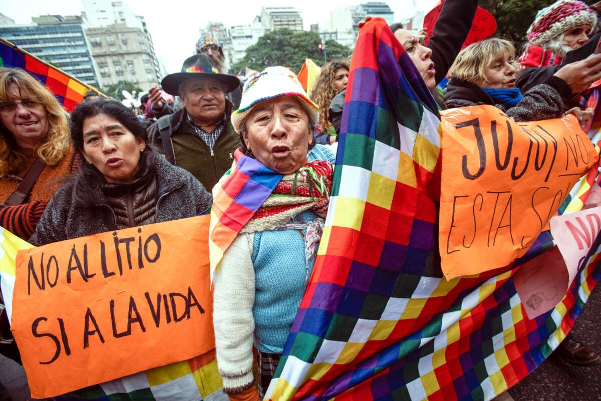 Protesters chant slogans while holding placards during a demonstration in support of the people of Jujuy on June 20, 2023, in Buenos Aires, Argentina.