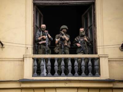 Members of the Wagner Group stand on the balcony of the circus building in the city of Rostov-on-Don, Russia, on June 24, 2023.