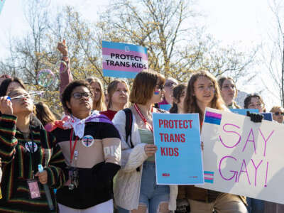 Teens gather in front of the Kentucky Capitol Annex building to protest against SB150, which would ban gender-affirming health care for transgender teens, on March 29, 2023, in Frankfort, Kentucky.