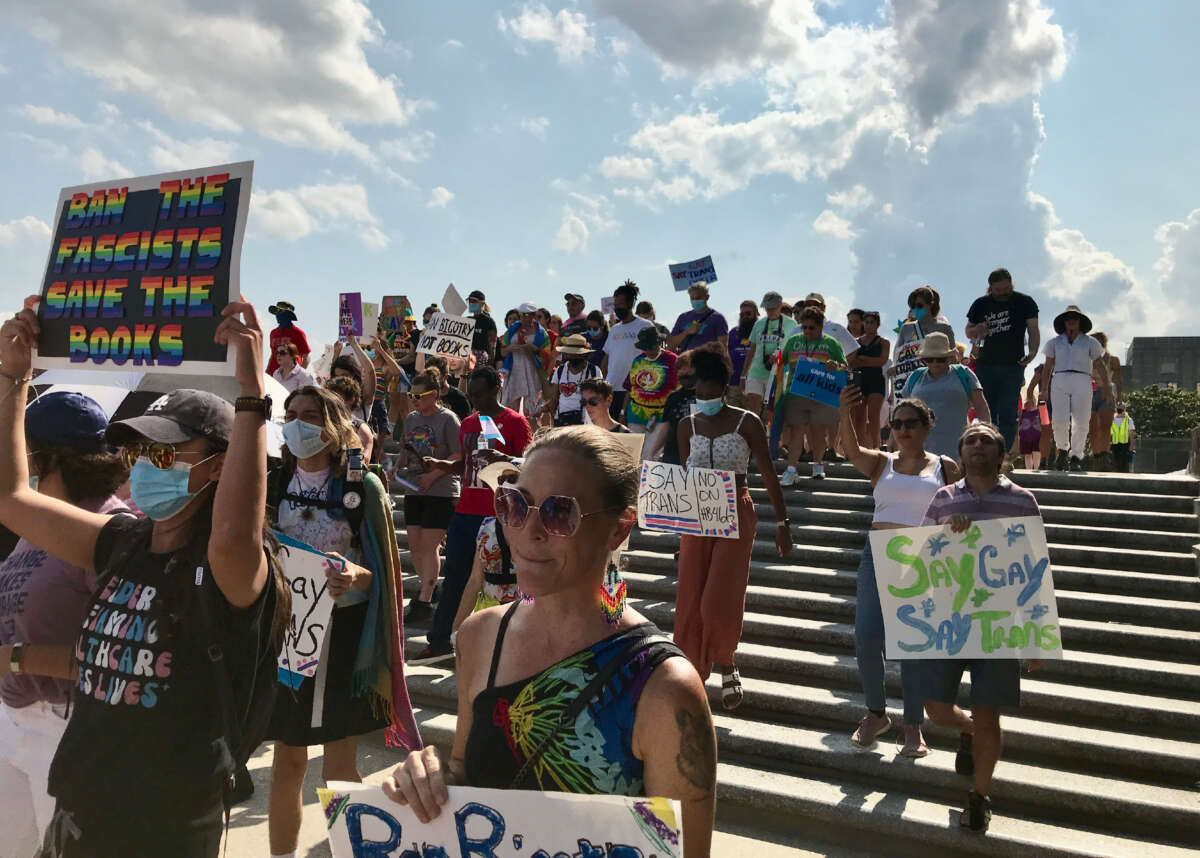 Protesters march from the capitol in Baton Rouge, Louisiana, to the governor's mansion to urge Gov. John Bel Edwards to invoke his veto powers against all anti-LGBTQ+ and anti-child bills, on May 27, 2023.