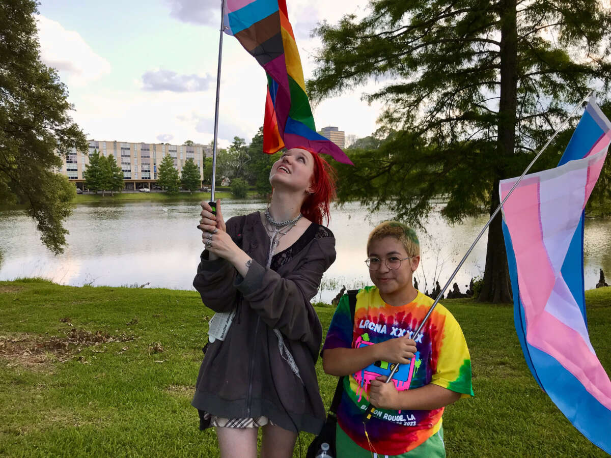Katie Rose and Jésus, after marching with their pride flags, on May 27, 2023.