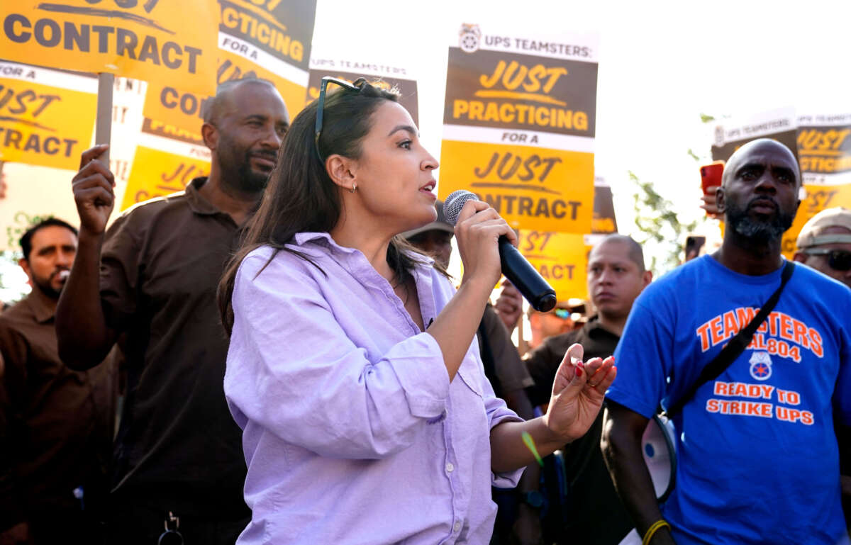 Rep. Alexandria Ocasio-Cortez speaks to United Parcel Services (UPS) workers during a 'practice picket line' on July 7, 2023, in the Queens borough of New York City, ahead of a possible UPS strike.