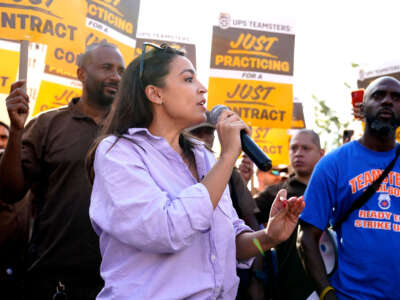 Rep. Alexandria Ocasio-Cortez speaks to United Parcel Services (UPS) workers during a 'practice picket line' on July 7, 2023, in the Queens borough of New York City, ahead of a possible UPS strike.