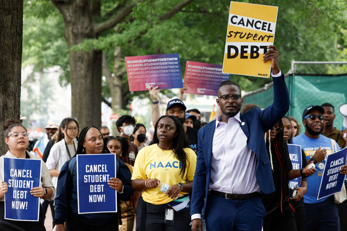 People for student debt relief demonstrate in front of the White House after the U.S. Supreme Court struck down President Biden's student debt relief program on June 30, 2023, in Washington, D.C.