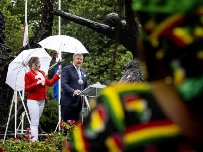 King of the Netherlands Willem-Alexander (center) delivers a speech during the National Remembrance Day of Slavery in Oosterpark, Amsterdam, on July 1, 2023.