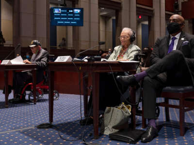 Hughes Van Ellis (left), a Tulsa Race Massacre survivor and World War II veteran, and Viola Fletcher (2nd right), oldest living survivor of the Tulsa Race Massacre, testify before the Civil Rights and Civil Liberties Subcommittee hearing on Capitol Hill in Washington, D.C.