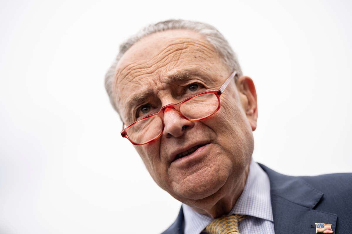 Senate Majority Leader Chuck Schumer speaks to reporters outside the U.S. Capitol upon returning from the White House on May 16, 2023, in Washington, D.C.