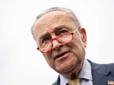 Senate Majority Leader Chuck Schumer speaks to reporters outside the U.S. Capitol upon returning from the White House on May 16, 2023, in Washington, D.C.