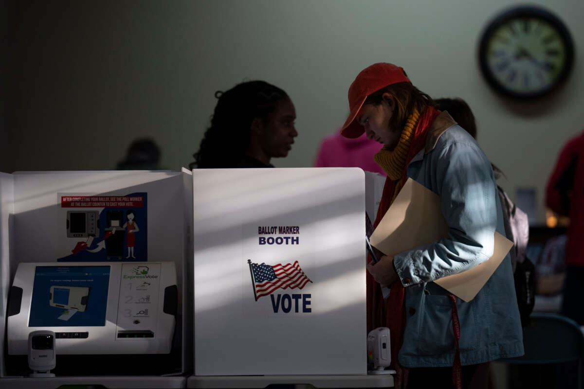 People vote at a polling location at Indianola Church of Christ on Election Day on November 8, 2022, in Columbus, Ohio.