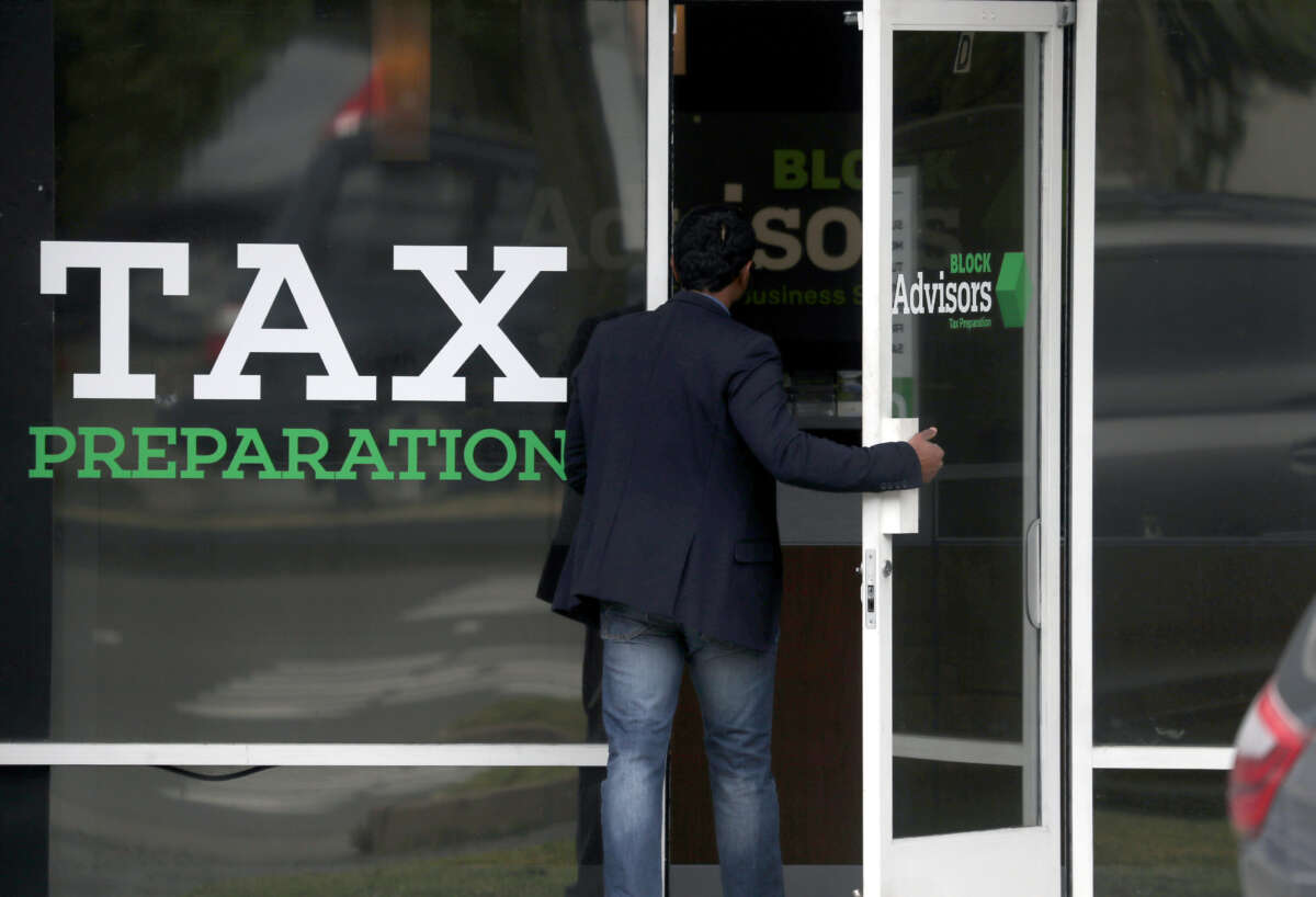 A customer enters a Block Advisors tax preparation office on April 15, 2019, in San Anselmo, California.